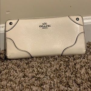 nude coach wallet
